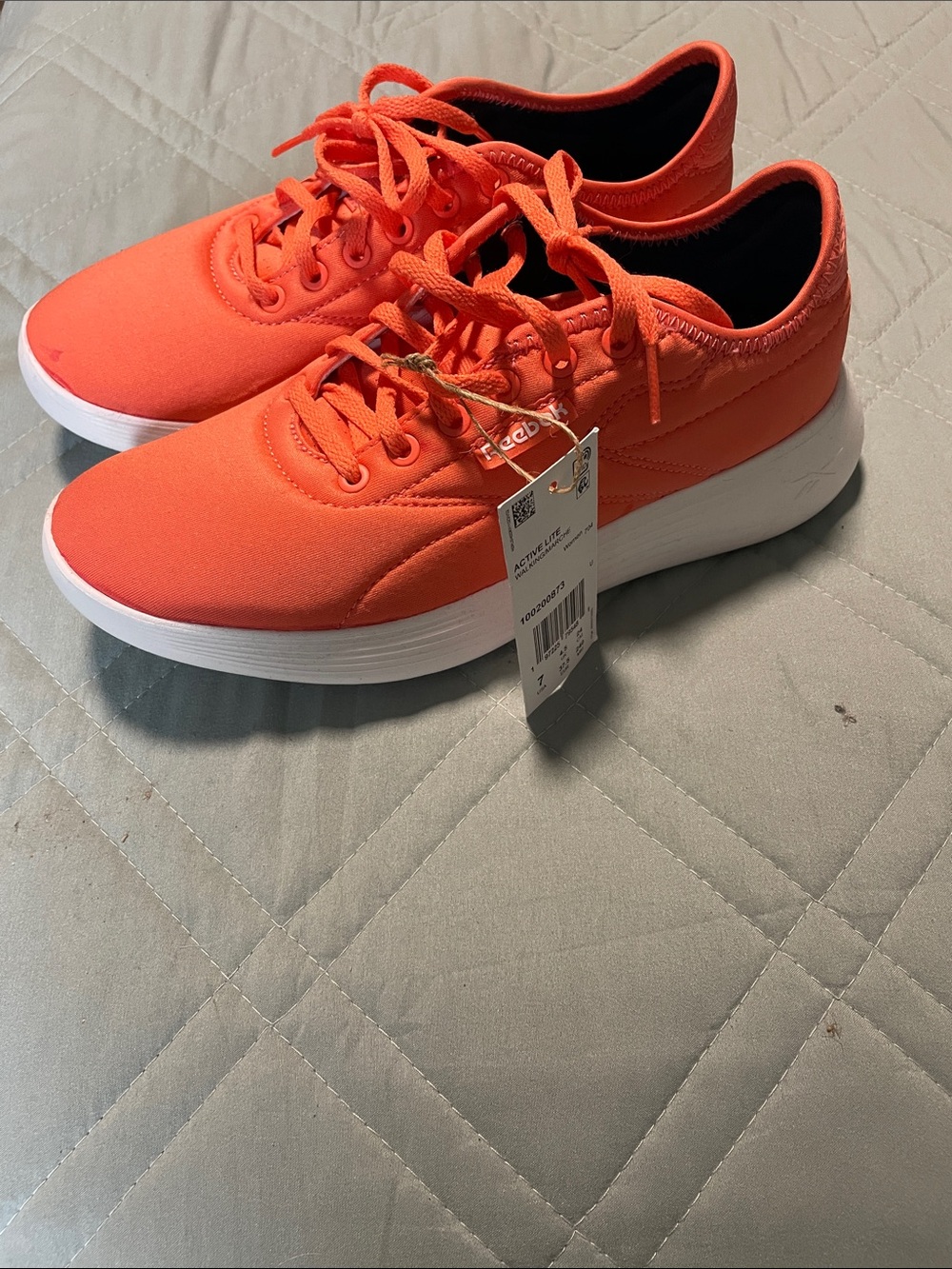 Reebok Women's Athletic Sneakers in Bright Coral Orange and White